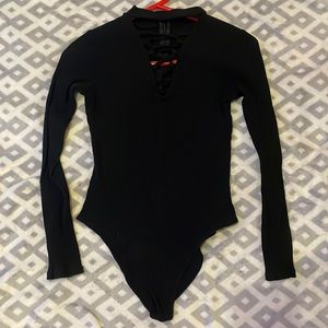Large Black Zip Bodysuit with criss cross front